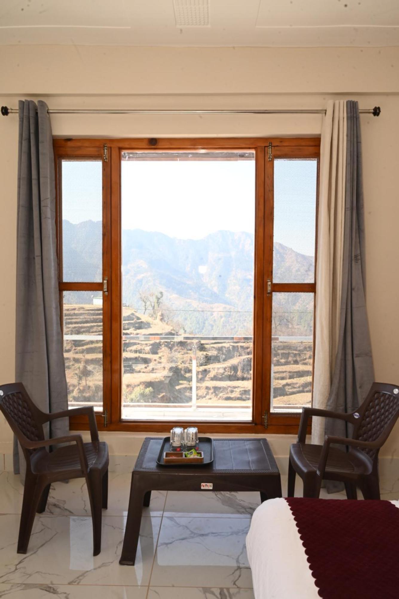 Himalayan Hill Top Resort Канатал Екстер'єр фото